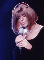 Steven Brinberg accurately portrays the glamor exuded by Barbra Streisand in both appearance and voice!